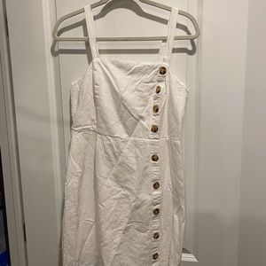 White linen dress with tortoise buttons